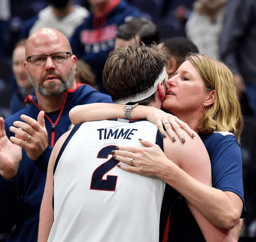 Parent and athlete reviewing the recruitment process together