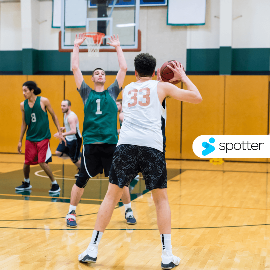 Basketball players during practice in a university gym in the US