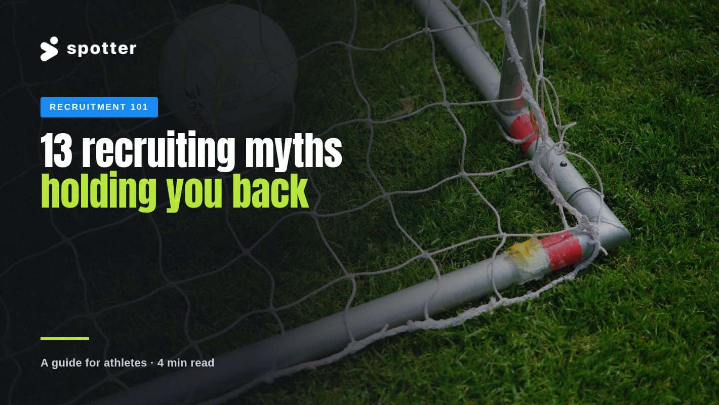 A soccer ball resting in the corner of a goal net on green grass.