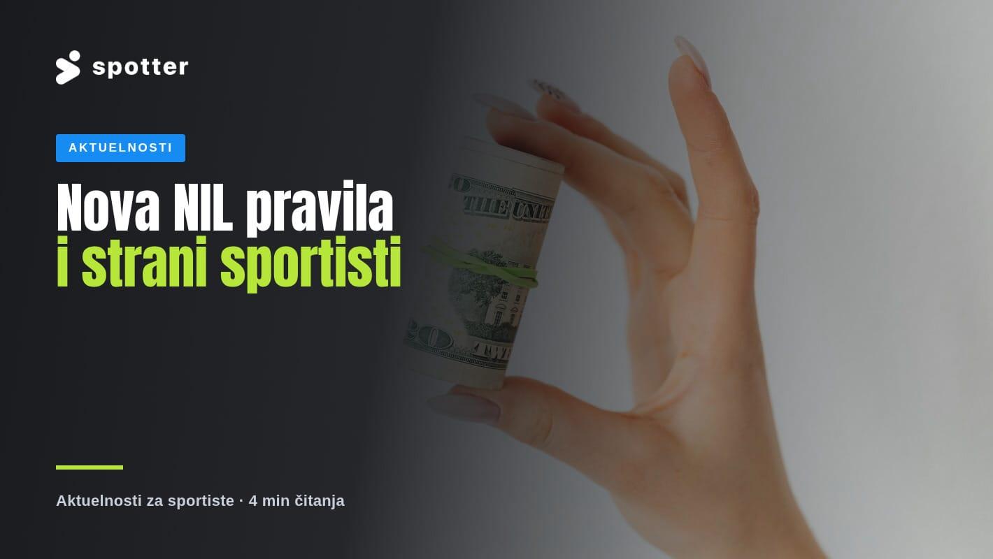 Ruka drži smotuljak američkih dolara na beloj pozadini.